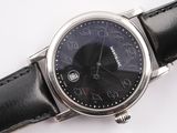a close up of a wrist watch on a white surface