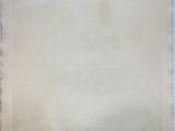 an old piece of paper sitting on top of a table