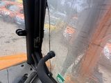 a view from inside of a bus looking out the window
