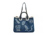 the small denim tote bag has a chain handle and is decorated with cats