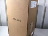 a box that is sitting on a table in front of a wall