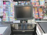 an image of a computer in a store with a lot of items
