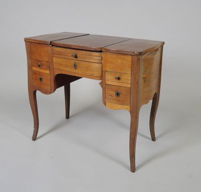an old wooden desk with two drawers and a drawer underneath it