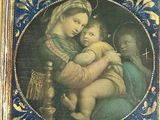 painting of a woman holding a child in a gold frame