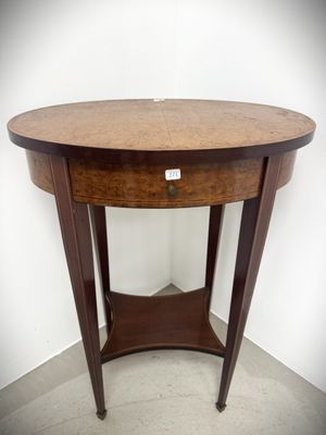 an image of a round table with a drawer on it