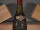 a bottle of wine that is sitting on a table