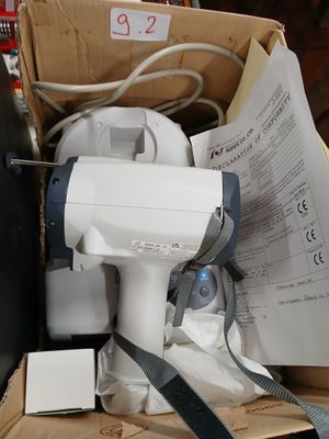 a box with a hair dryer and other items in it