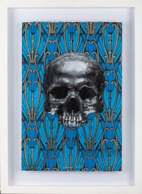 an image of a skull on a blue and gold background