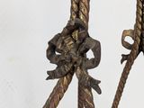 pair of antique iron and rope table lamps with a brass finish