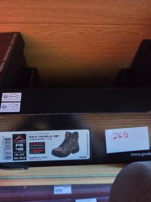 a box of shoes on a shelf in a store