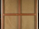 an easel with a piece of canvas on top of it sitting on a table