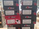 four boxes of u - power products are stacked on top of each other