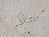 a close up of the name of a baseball player on the base
