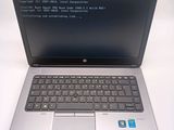 a laptop computer with a program on the screen