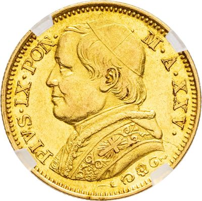 un gros plan d'une pièce d'or à l'effigie d'un homme