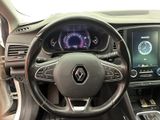 a picture of the interior of a car with a steering wheel