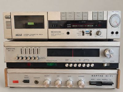 three different types of audio equipment stacked on top of each other