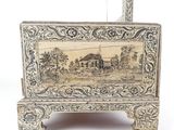 a picture of a wooden box with a picture on it