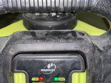 a close up of a person ' s hand holding a power tool