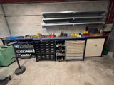 a workbench in a garage with lots of tools on it