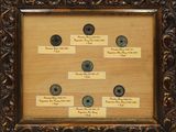 an old picture of a picture of a family tree in a frame