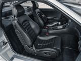 the interior of a car with black leather seats and black leather trims