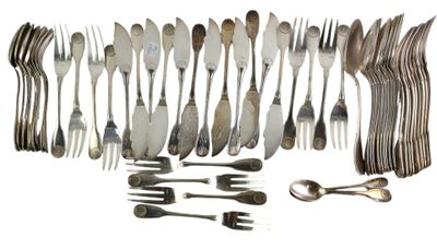 many forks and spoons arranged together on a table