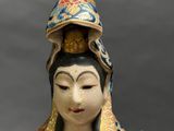 chinese figurine of a woman in a blue and gold dress