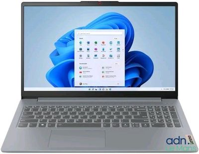 a close up of a laptop on a white surface with a blue background