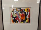 tableau représentant un groupe de personnes, dans un cadre noir accroché au mur