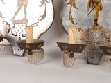 two decorative plates that are sitting on a table