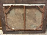 a picture of an old window with a broken glass