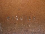 a close up of a metal object with the word h a quinlly written on it