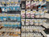 many different types of toothbrushes on display in a store
