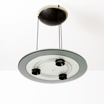 a light that is hanging from the ceiling in the room