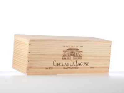 a wooden box with a bottle of wine inside of it