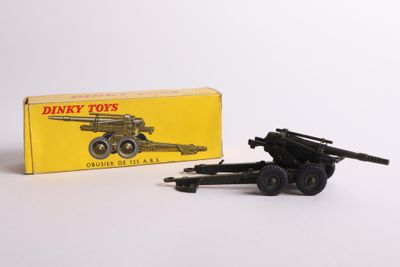 an image of a toy gun and a box of toy guns