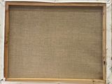 an old picture frame with a burlock canvas and a wood frame