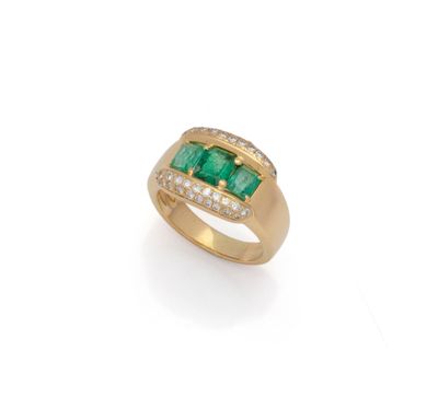 an emerald and diamond ring