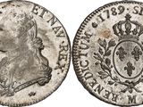 an old silver coin with a crown on it