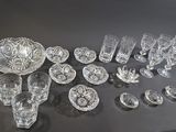 a lot of glass items that are on the table