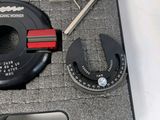 a tool in a case that is sitting on a table