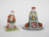 pair of chinese figurines of a man and a woman
