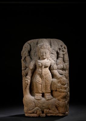 an image of a stone statue of a woman with a child