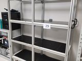 a metal shelf with a number on it in a room