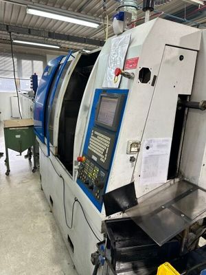 1 tour à commande numérique MANURHIN K'MX type Swing 7020