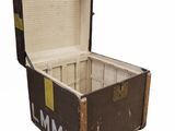 an old suitcase with the lid open on a white background