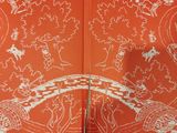 an open book with a picture of a bird and a bridge on it