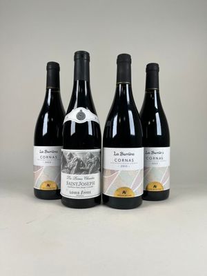 three bottles of wine are lined up on a table