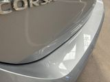a close up of a car ' s emblem on the front of it
